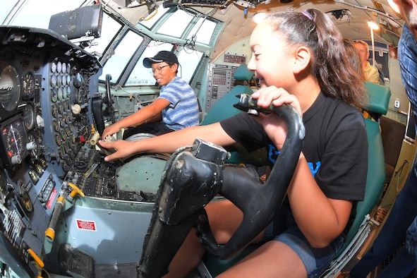 (Left to right) Students Adrian Sanchez and Jocelyn Martinez manipulate the controls of a C-130 aircraft at the Hill Aerospace Museum during a LEGACY (Leadership Experience Growing Apprenticeships Committed to Youth) program field trip June 14, 2019, at Hill Air Force Base, Utah. LEGACY is an Air Force program aimed at building interest in science, technology, engineering and math (STEM) through hands-on activities while showing how STEM applies to the world. (U.S. Air Force photo by Todd Cromar)