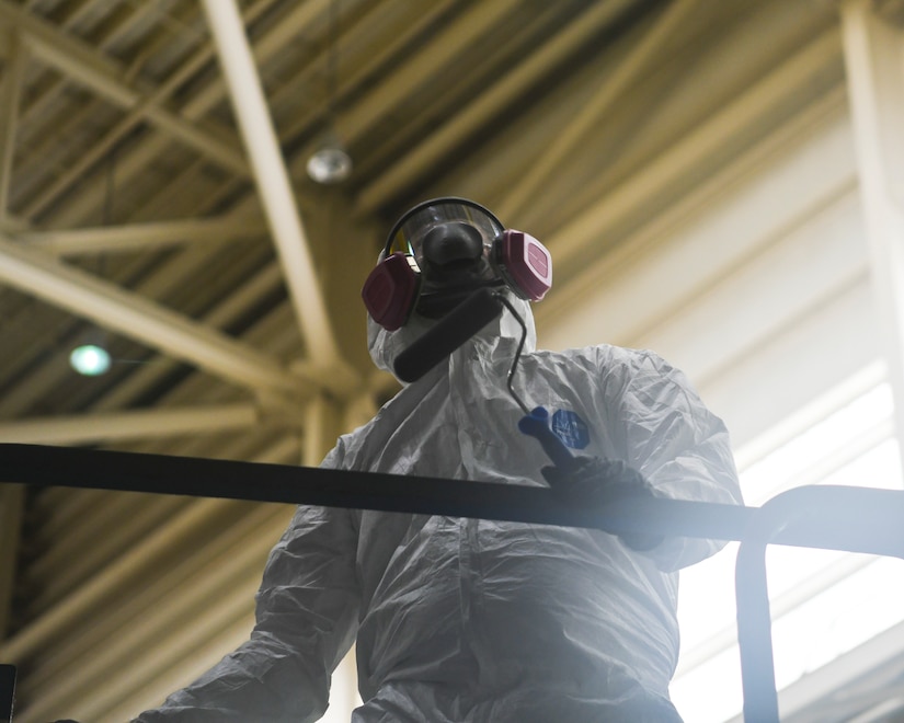 A U.S. Air Force aircraft structural maintenance technician from the 437th Maintenance Squadron applies the outer coating of aircraft paint to a C-17 Globemaster III July 2, 2019 at Joint Base Charleston, S.C. The technicians at JB Charleston maintain C-17s in support of maintaining a global reach airlift capability. Structural maintenance technicians advise on and maintain the structural and low observable repair, modification and corrosion protection treatment of various types of aircraft.