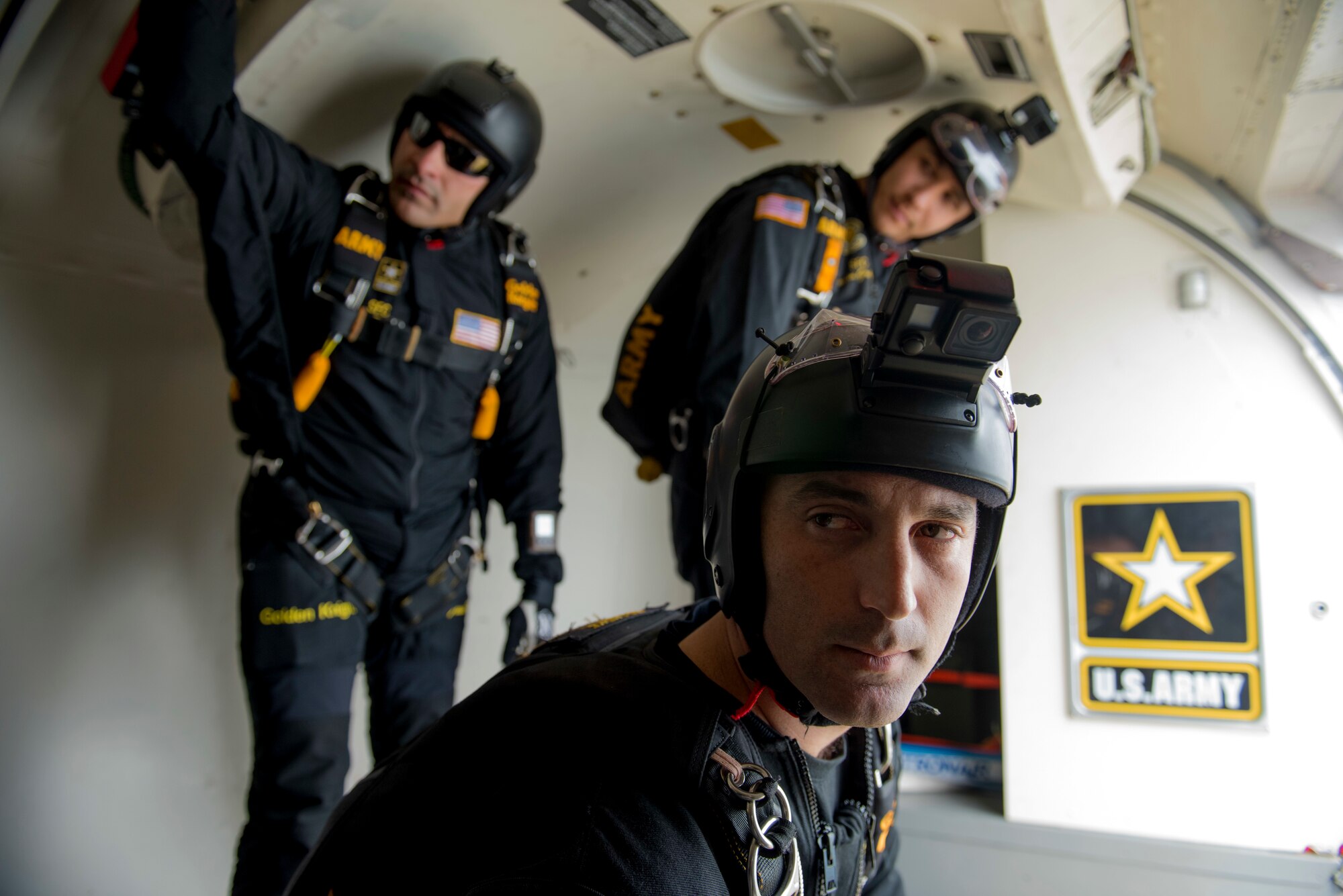 Members of the U.S. Army Golden Knights parachute team receive jump condition information prior to jumping during the Skyfest 2019 Open House and Air Show at Fairchild Air Force Base, Washington, June 22, 2019. Fairchild opened its gates to the public for a free one-day event to showcase Pacific Northwest airpower and U.S. Air Force capabilities. The airshow included the F-22 Demonstration Team, U.S. Army Golden Knights and 11 other aerial acts. (U.S. Air Force photo by Airman 1st Class Lawrence Sena)