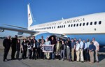 Air Force Gen. Joseph L. Lengyel, center, stands with entertainers and performers who are part of the USO tour to Europe, Africa and Southwest Asia, during a stop at Ramstein Air Base, Germany, July 2, 2019.