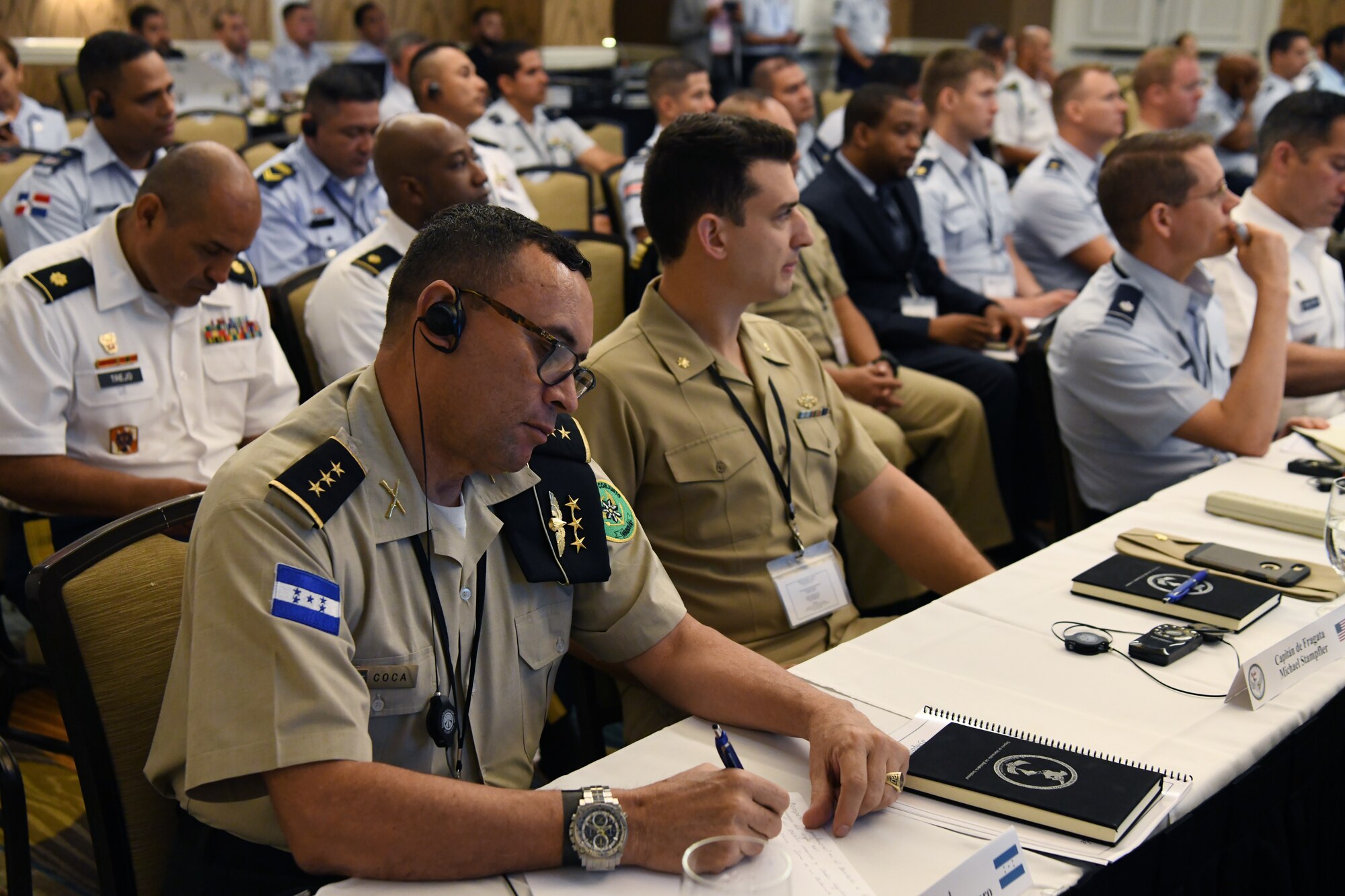 Visiting foreign mission partners take notes during the 4th annual Western Hemisphere Exchange Symposium May 19-24 at San Antonio, Texas.
