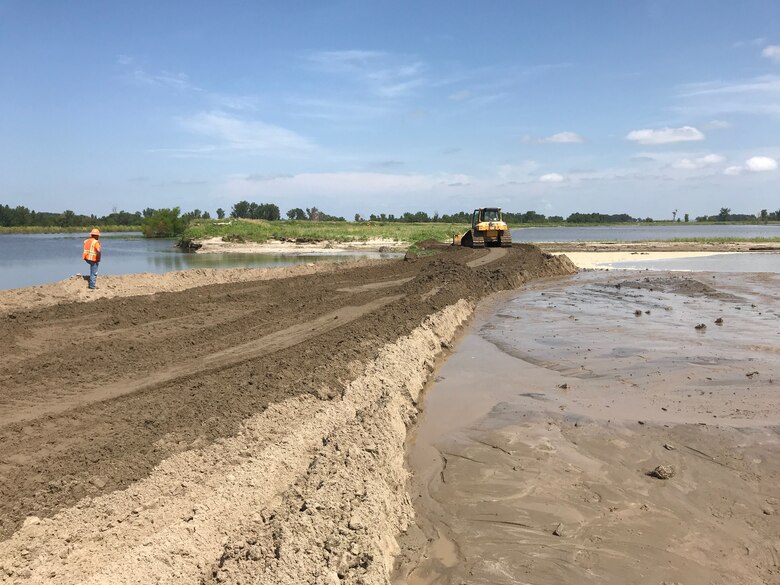 The U.S. Army Corps of Engineers, Omaha District closes a breach at Levee L601 near Bartlett, Iowa July 3, 2019.