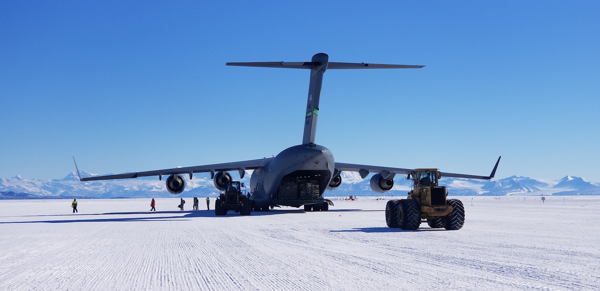 A Team McChord C17 is unloaded at McMurdo Station, Antarctica.
