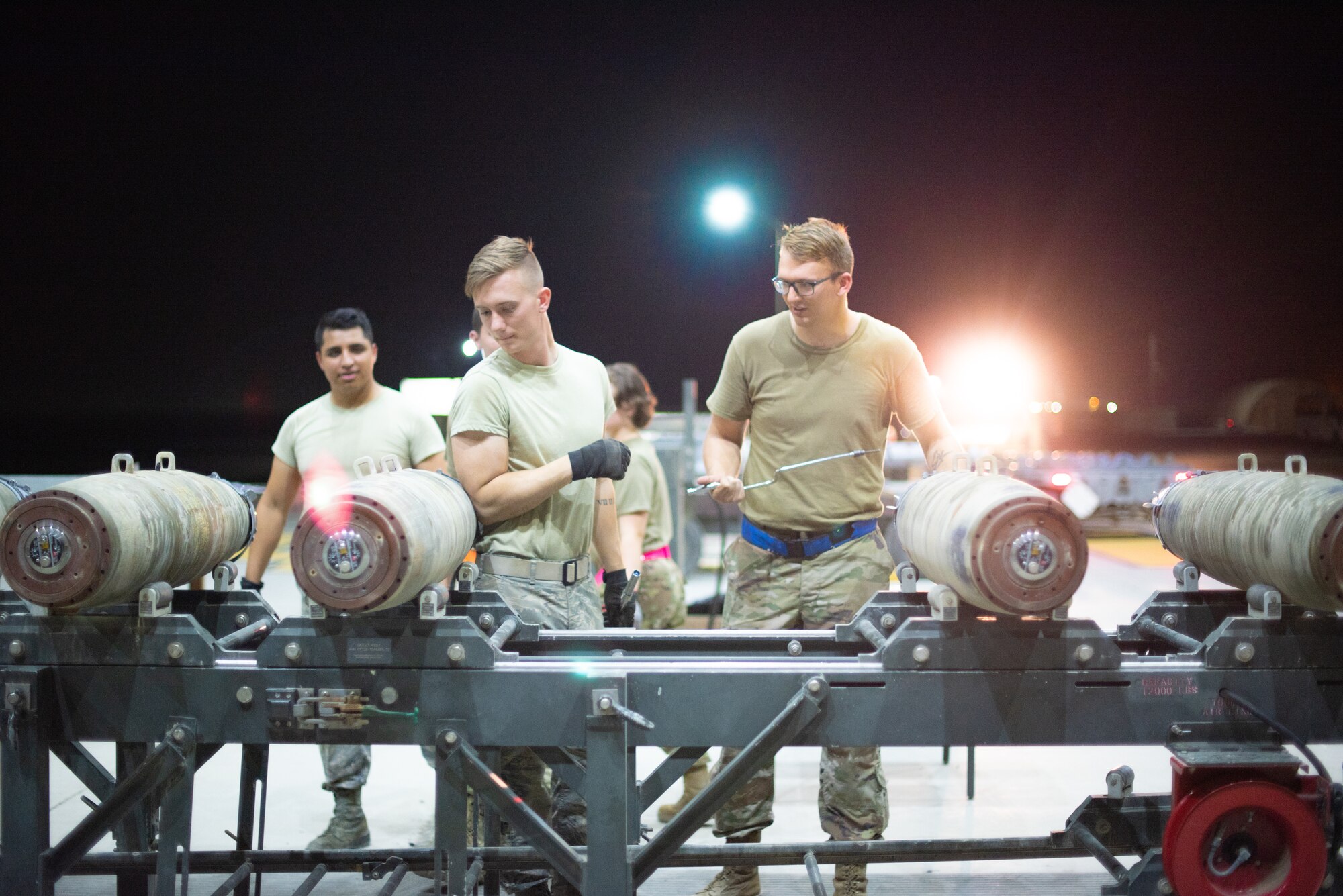 Airmen of the 380th Expeditionary Maintenance Squadron build six GBU-38s June 21, 2019, at Al Dhafra Air Base, United Arab Emirates.