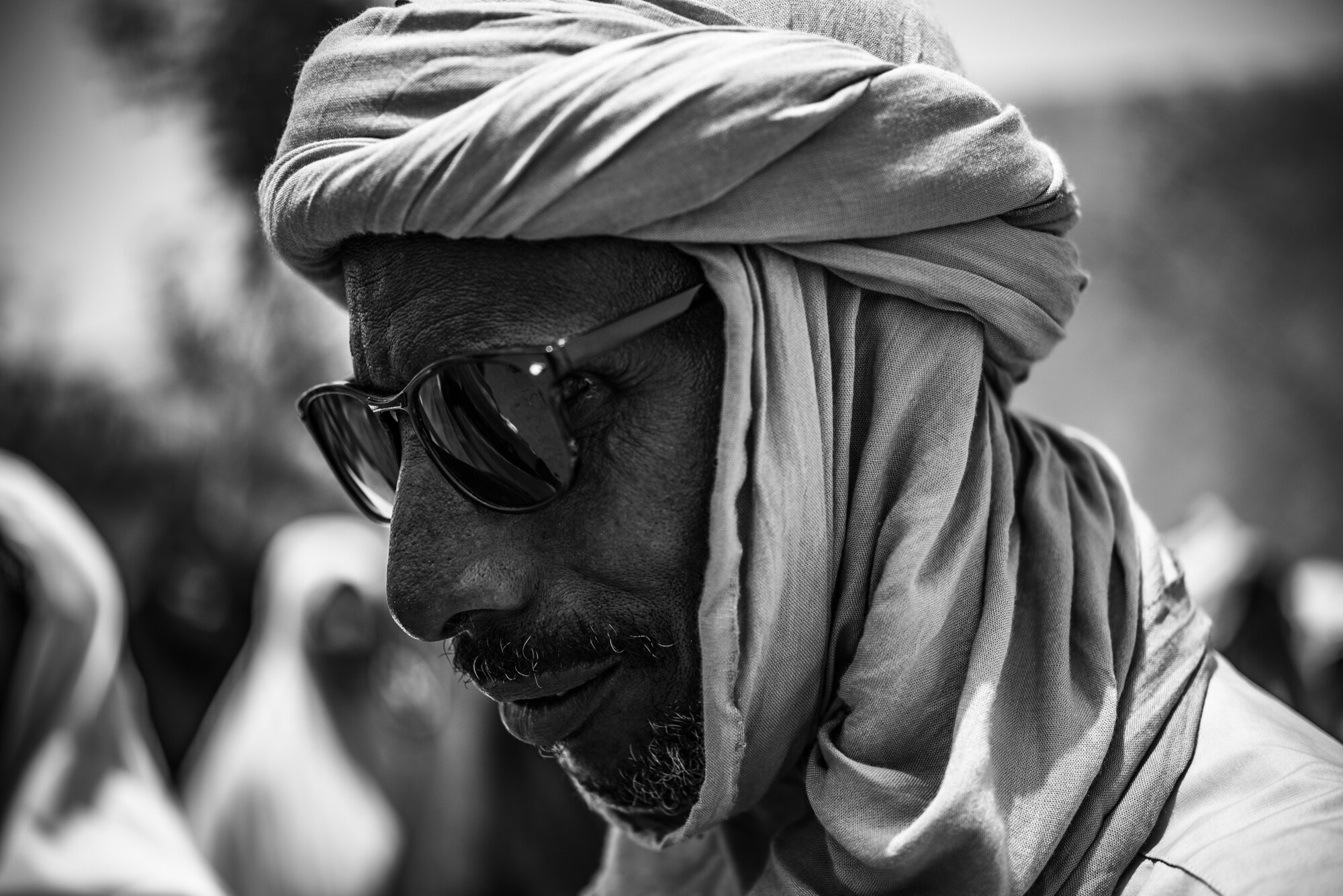 Mohammed Rhoua, Salkad School Parents Association president, interacts with people in Agadez, Niger, June 27, 2019. Salkad is a village near Nigerien Air Base 201. Airmen assigned to the 724th Expeditionary Air Base Squadron civil engineer flight built a new classroom for the village. (U.S. Air Force photo by Staff Sgt. Devin Boyer)