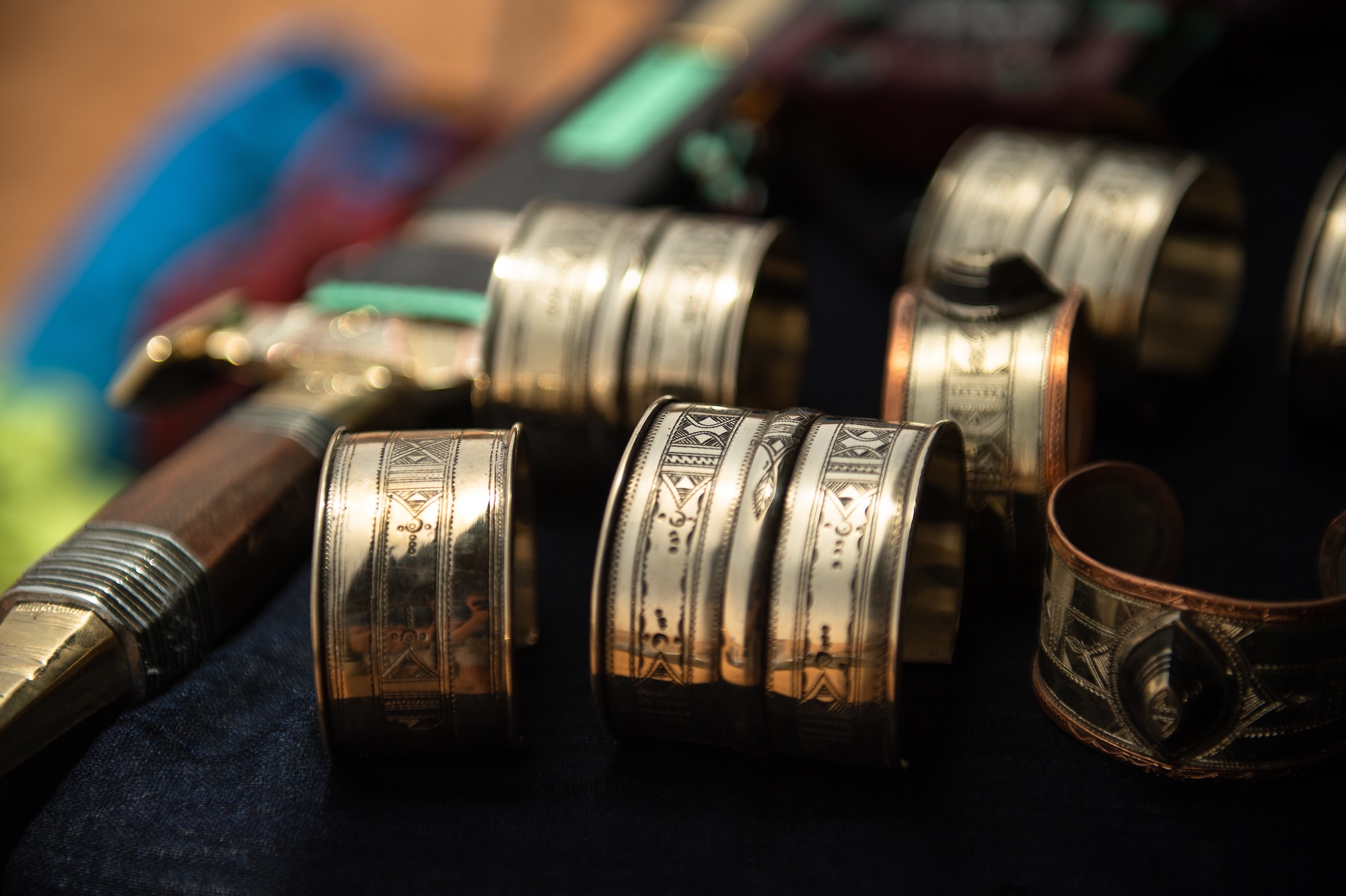 Handmade bracelets sit on a table during a bazaar at Nigerien Air Base 201 in Agadez, Niger, June 30, 2019. The base hosts the bazaar so service members who are deployed can experience the culture and bring home souvenirs to their families. (U.S. Air Force photo by Staff Sgt. Devin Boyer)