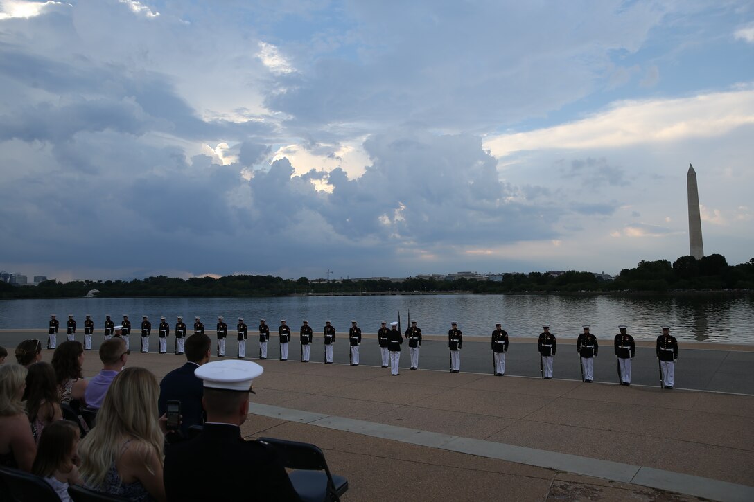 Marines with the U.S. Marine Corps Silent Drill Platoon execute their “long line” sequence during a Tuesday Sunset Parade at the Thomas Jefferson Memorial, Washington, D.C., July 2, 2019. The hosting official for the evening was Brigadier Gen. Lorna Mahlock, director, Command, Control, Communications and Computers, and the guest of honor was Ms. Sheila Casey, chief operating officer for the Hill and Chair of the Board of Directors for Blue Star Families. (U.S. Marine Corps photo by Sgt. Robert Knapp/Released)