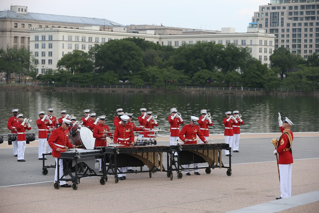 Marines with “The Commandant’s Own,” U.S. Drum and Bugle Corps perform a musical ballad during a Tuesday Sunset Parade at the Thomas Jefferson Memorial, Washington, D.C., July 2, 2019. The hosting official for the evening was Brigadier Gen. Lorna Mahlock, director, Command, Control, Communications and Computers, and the guest of honor was Ms. Sheila Casey, chief operating officer for the Hill and Chair of the Board of Directors for Blue Star Families. (U.S. Marine Corps photo by Sgt. Robert Knapp/Released)