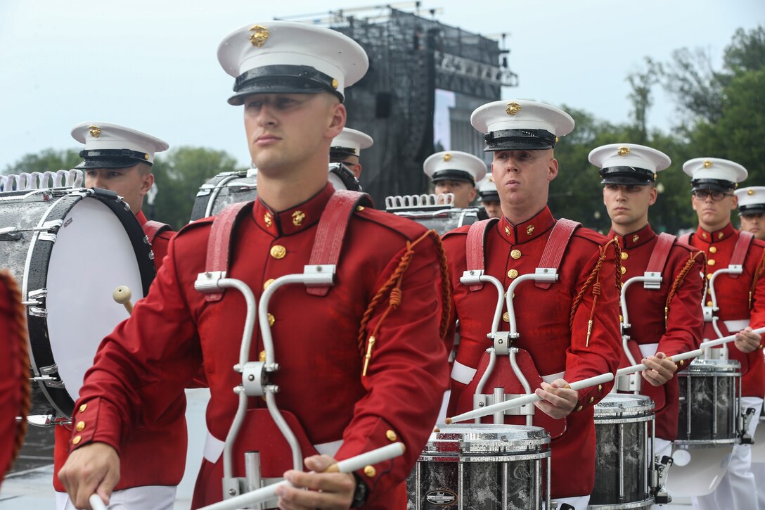 Marines with “The Commandant’s Own” U.S. Drum and Bugle Corps march off the deck at the Lincoln Memorial, Washington, D.C., July 4, 2019. The Honorable President Donald J. Trump hosted the “Salute to America” event, which was held to honor all service members past and present. The celebration showcased America’s military with music, military demonstrations and flyovers. (U.S. Marine Corps photo by Pfc. Allen Sanders)