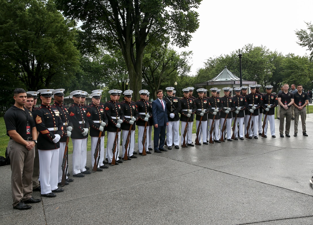 Marines with the U.S. Marine Corps Silent Drill Platoon pose for a photo with The Honorable Mr. Mark T. Esper, acting secretary of defense, at the Lincoln Memorial, Washington, D.C., July 4, 2019. The Honorable President Donald J. Trump hosted a “Salute to America” event which was held to honor all service members past and present. The celebration showcased America’s military with music, military demonstrations and flyovers.  (U.S. Marine Corps photo by Pfc. Allen Sanders)