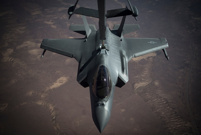 An F-35A Lightning II conducts aerial refueling with a KC-10 Extender