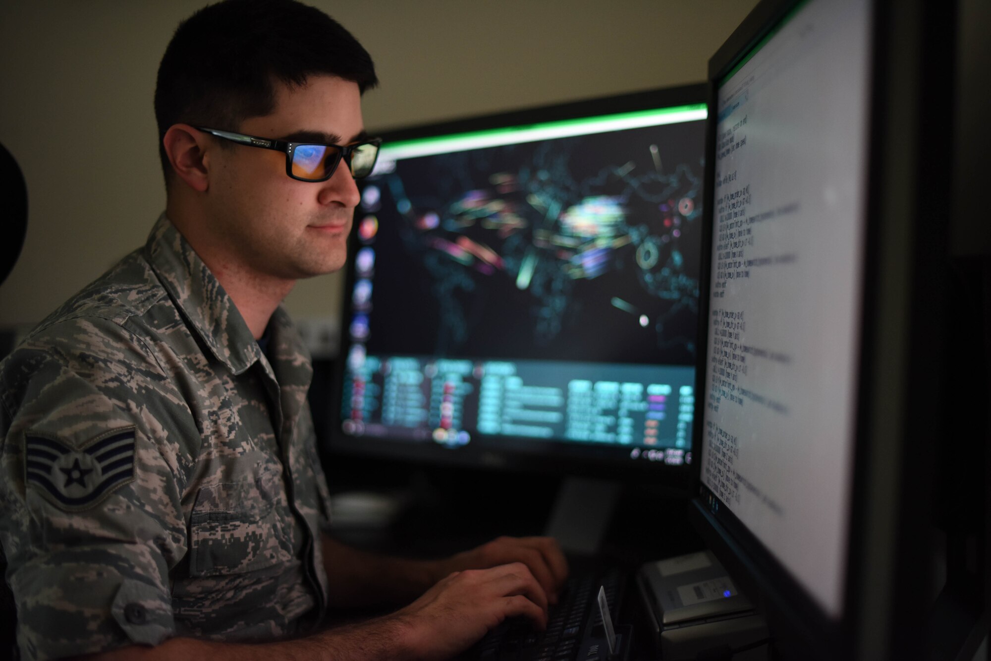 U.S. Air Force Staff Sgt. Caleb uses a computer programs to identify network issues during his unit's training period at Berry Field Air National Guard Base, Nashville, Tenn.