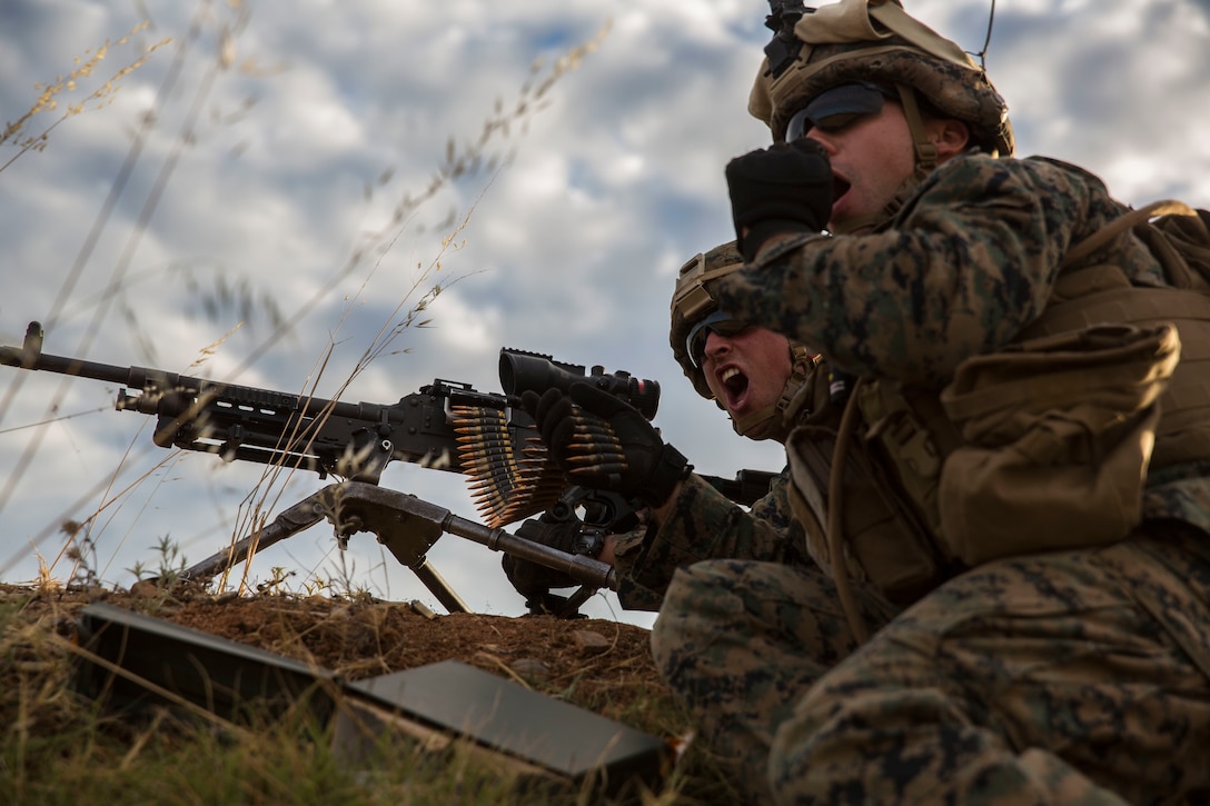 U.S. Marines with Special Purpose Marine Air-Ground Task Force-Crisis Response-Africa 19.2, Marine Forces Europe and Africa, fire an M240B machine gun during a squad attack on Campo De Maniobras, Base General Menacho, Spain, June 18, 2019. The Marines integrated with the Spanish Army to enhance interoperability with their allies. (U.S. Marine Corps photo by Cpl. Margaret Gale)