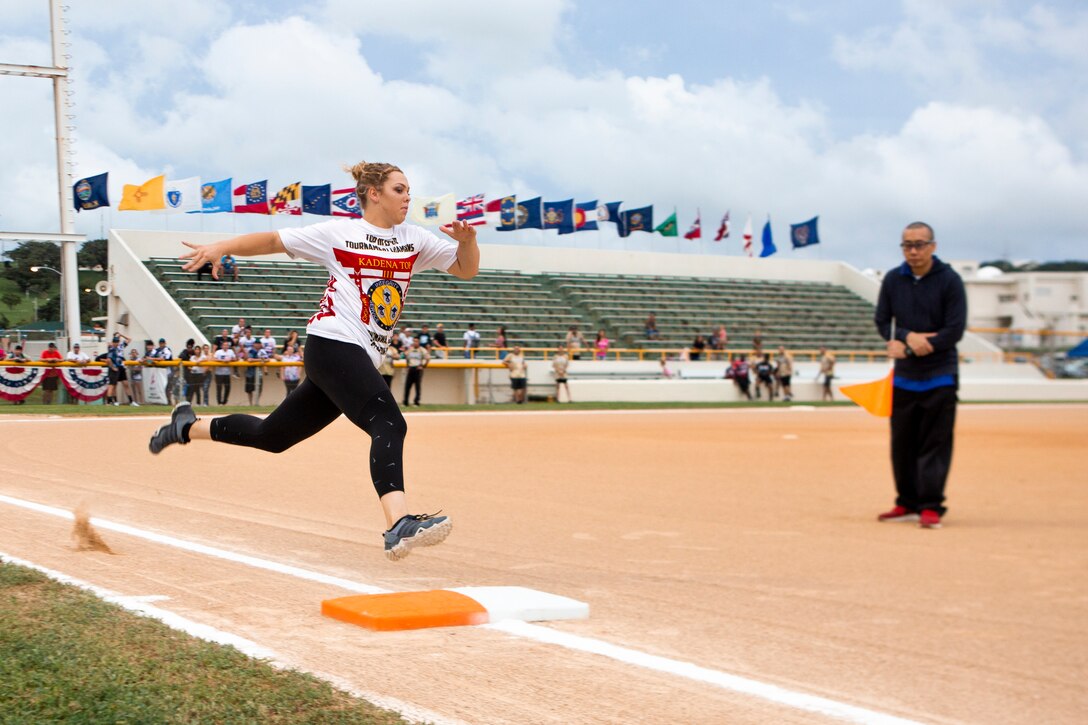 Taylor Delval, Status of Forces Agreement personnel, sprints home in the Base Running Competition on Camp Foster, Okinawa, Japan, July 3, 2019. The challenge was part of the Pacific-Wide Firecracker Softball Skills Challenge; a trial to test a player’s skills on how well a player can perform in a specific element of the sport.