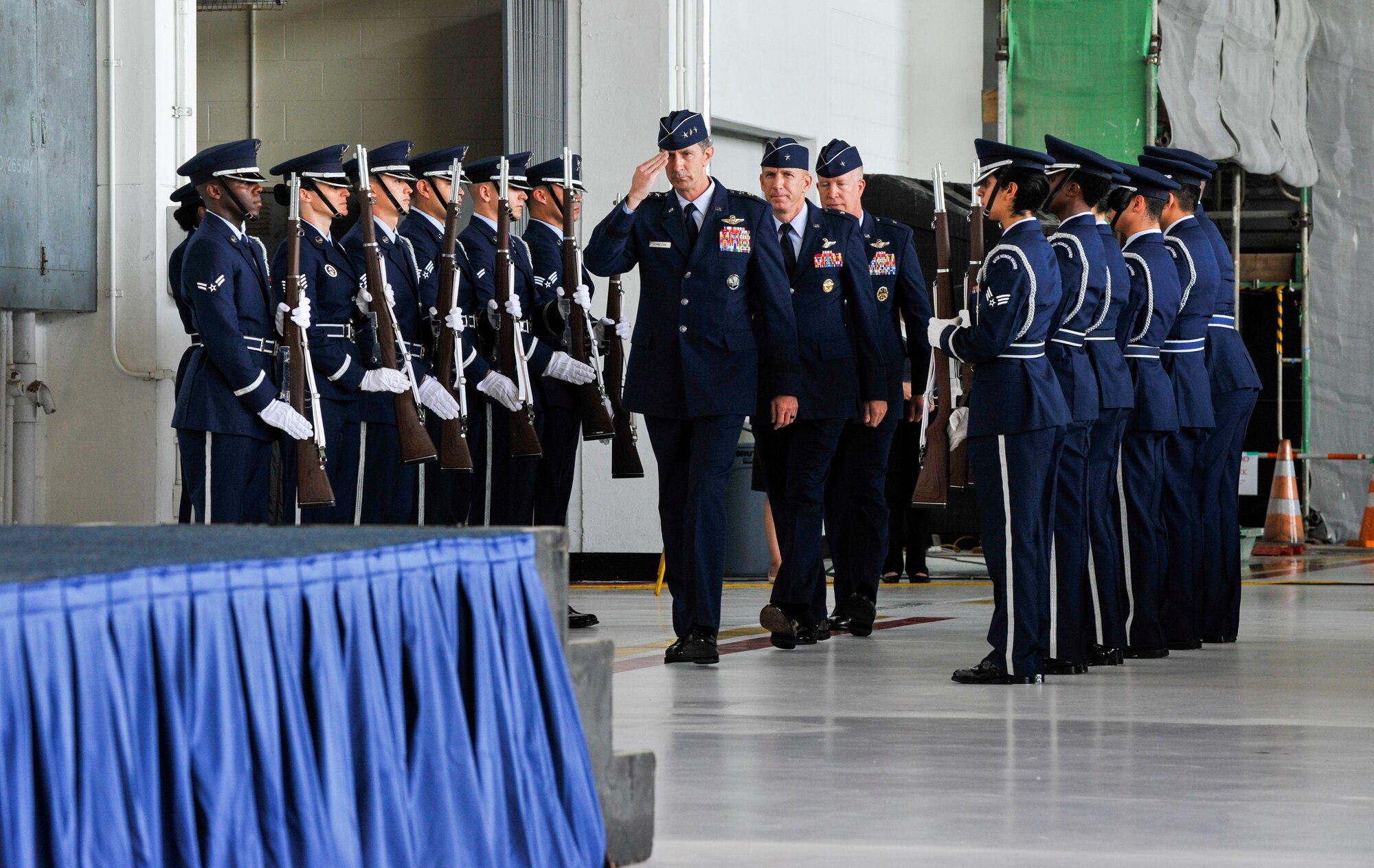 U.S. Air Force Lt. Gen. Kevin Schneider, U.S. Forces Japan and 5th Air Force commander, salutes Shogun Airmen during the 18th Wing change of command ceremony July 8, 2019, at Kadena Air Base, Japan.