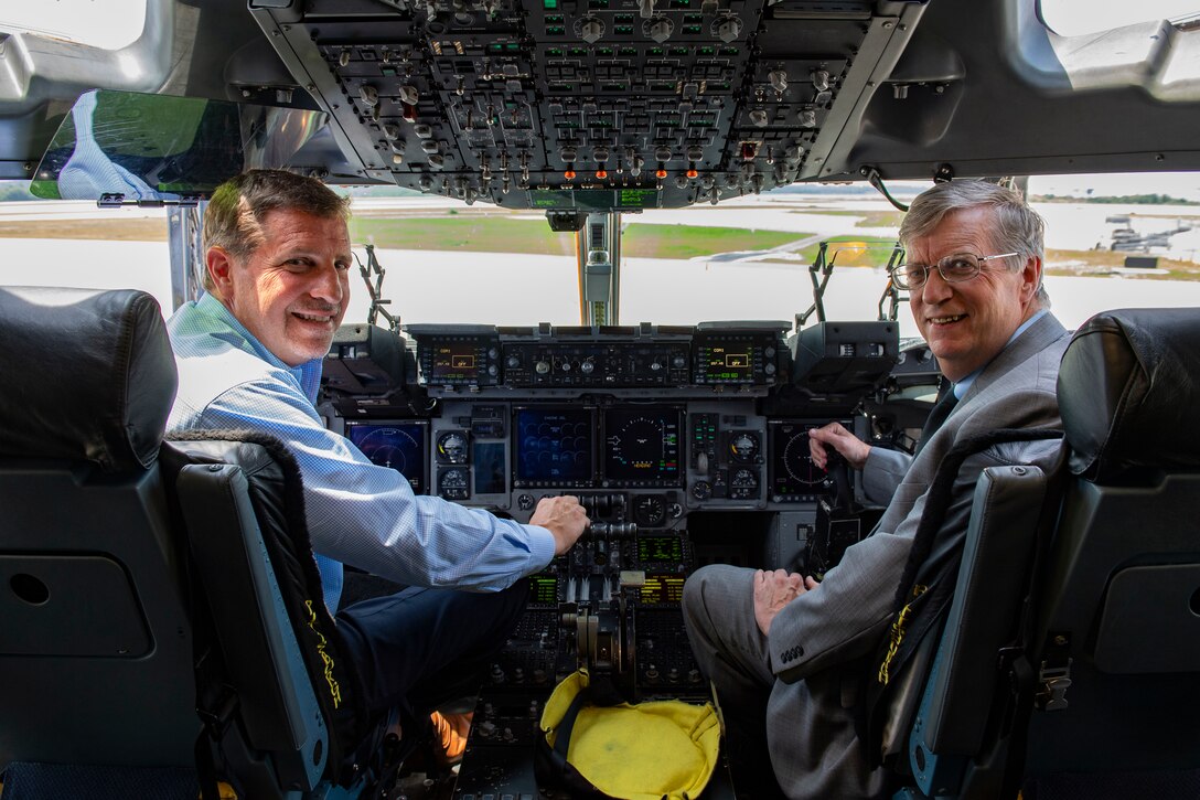 Chris Heck, President/CEO of the Pittsburgh Airport Area Chamber of Commerce, and Doug Keeter, Membership Director of the PAACC, tour a C-17 Globemaster III aircraft at the Pittsburgh International Airport Air Reserve Station, Pa., June 28, 2019. The aircraft was assigned to the 911th Airlift Wing, who recently converted from the C-130 Hercules to the C-17 Globemaster III. (U.S. Air Force photo by Joshua J. Seybert)