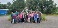 FROM LEFT TO RIGHT: Elizabeth River Project - ODU Intern James McCann; Elizabeth River Project's Yolima Carr; Elizabeth River Project's Larry LaPell; Cradock Civic League's Krystal Hicks and daughter Daisy; Code 361 Chops Clarke and daughter Erin; Code 926 Colleen Clarke; Code 926 Joanna Wynne-Pate; Destiny Simpson, Clarice Pate, and Maryjo Wynne-Pate; Code 361 Craig Carter; Mia Clarke, Code 220A Jessica Roberts; John-Michael Gardner; Code 136.1 Jay Winslow; Code 930 Ricky Tolentino; NNSY-Retired Forest Lilly; MARMC Eugenie Jones. NOT PICTURED: NNSY-Retired Stacy Lilly; Code 1160 Kristi Britt.