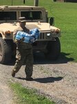 West Virginia Army National Guard Soldiers provide welfare checks, water distribution, and debris removal in and around Harman, West Virginia, July 7, 2019 to assist residents who were affected by flooding June 30, 2019. The Soldiers have distributed 65 cases of water and boxes of food to residents as well as delivered two water buffalos to provide potable water to those in need. (Courtesy photo)