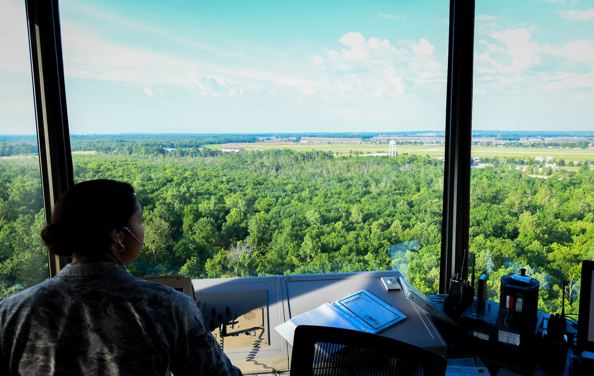 Senior Airman Bailey Hairston, 375th Operational Support Squadron air traffic controller, monitors the airspace over Scott Air Force Base
