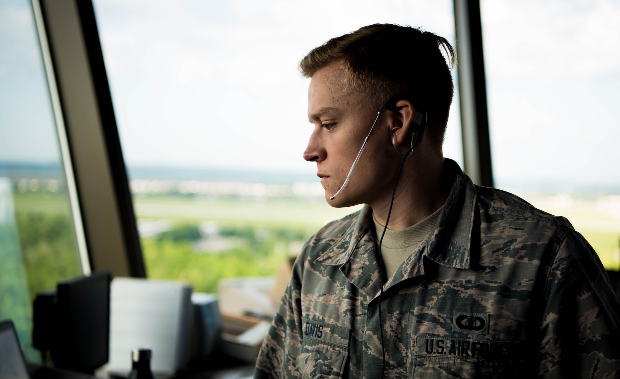 Senior Airman Nick Davis, 375th Operational Support Squadron air traffic controller, monitors flight data