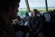 Airman 1st Class Nicklas Hartman talks with Senior Airman Eric Davis, 375th Operational Support Squadron air traffic controllers
