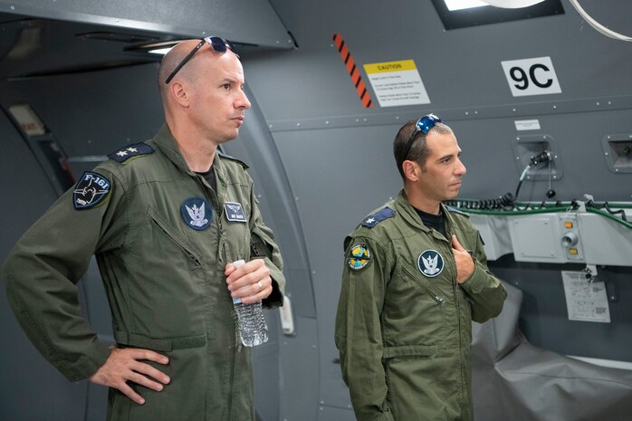 Two members of the Israeli air force Air Attaché to the United States of America tours the KC-46A Pegasus Fuselage Trainer, July 1, 2019, at Altus Air Force Base, Okla. The IAF was participating in an immersion tour of the 56 Air Refueling Squadron to explore replacing their 707 tanker fleet with the KC-46A. (U.S. Air Force photo by Airman 1st Class Breanna Klemm)