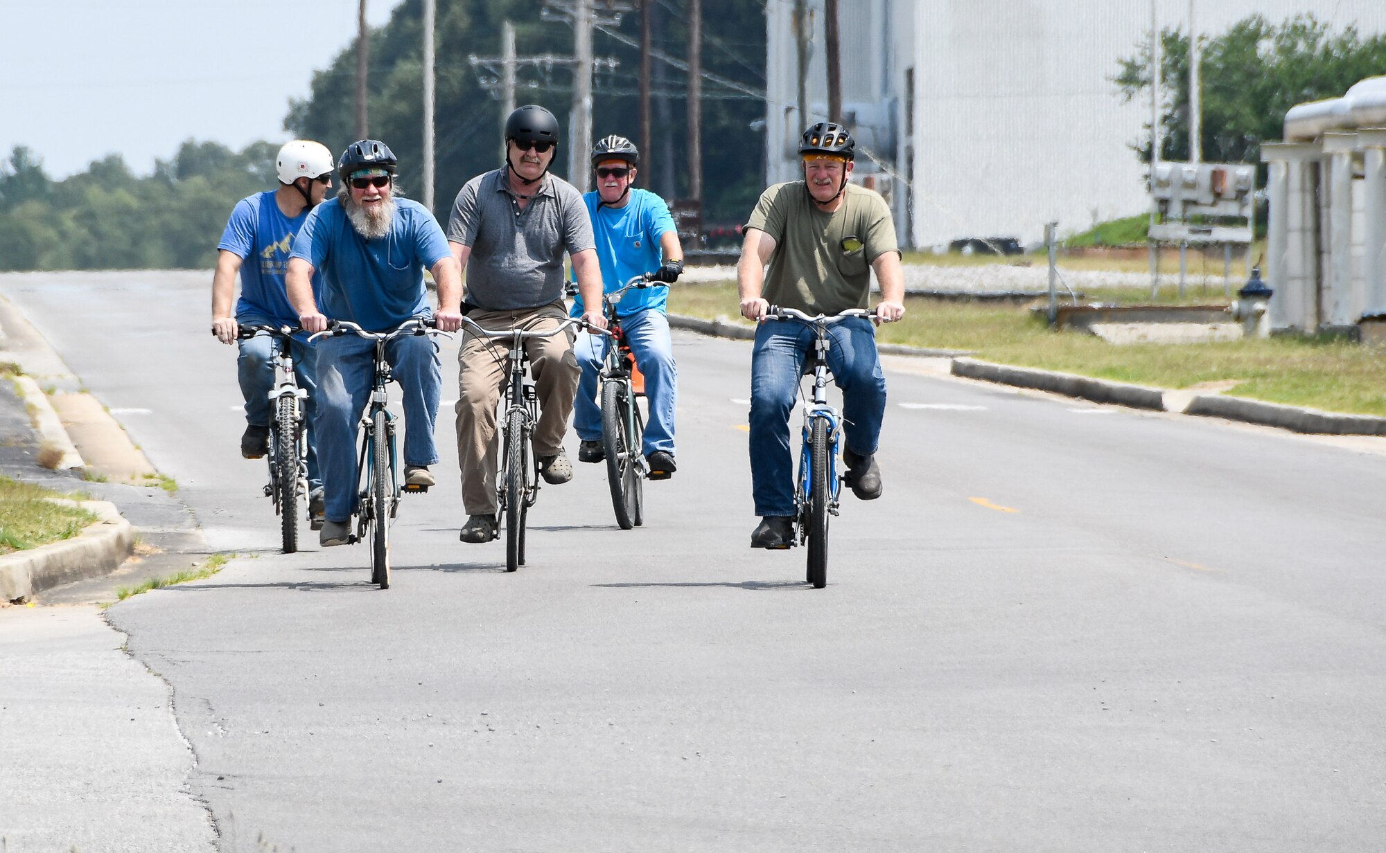 Team AEDC members, from left, Paul Mosley, Jim Ring, Don Thompson, Mike Lance and Tim Orange bicycle during their lunch break June 3 at Arnold Air Force Base. Others that ride with the group, not pictured, are Matt Lance, Perry Hoge, Chad Hartman and James Whaley. Lance began riding with one or two others to fit exercise into his schedule and then others joined. (U.S. Air Force photo by Jill Pickett)