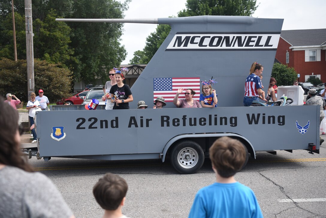 Members of Team McConnell ride McConnell’s KC-135 Stratotanker-inspired float July 4, 2019, in Derby, Kan. Derby celebrated its 150th anniversary of being an established city during it’s Fourth of July Parade. (U.S. Air Force photo by Airman 1st Class Alexi Myrick)