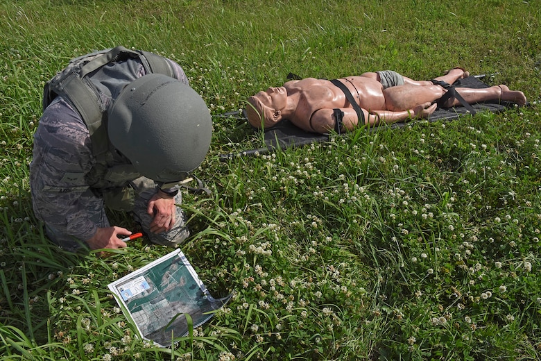 Airman 1st Class Cornelis Mol, 8th Security Forces Squadron 2019 Advanced Combat Skills Assessment team member, practices land navigation techniques at Kunsan Air Base, Republic of Korea, June 4, 2019. The month-long training prepared the five-person team for the ACSA competition and it also sharpened their real-world tactical knowledge, essential for every security forces members deployed or stationed overseas. (U.S. Air Force photo by Staff Sgt. Mackenzie Mendez)