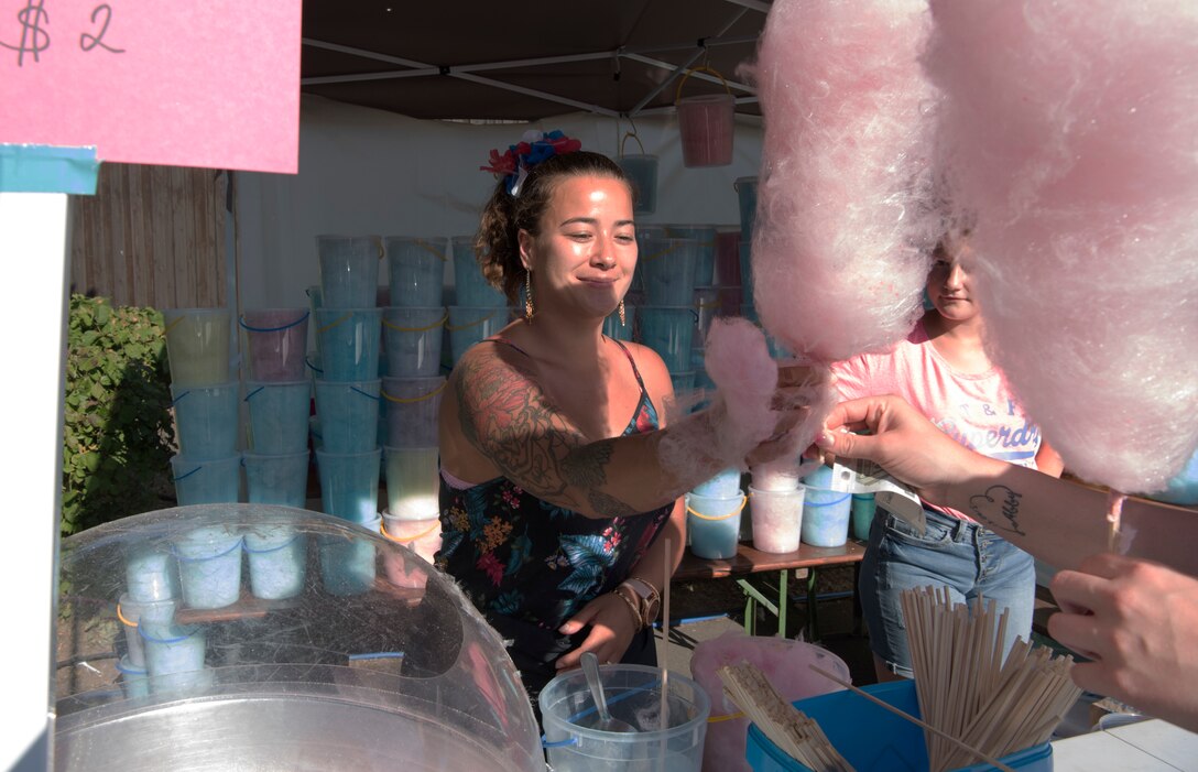 The event included treats for the community including chocolate, cookies, slushies, ice cream, candy ropes, and hamburgers