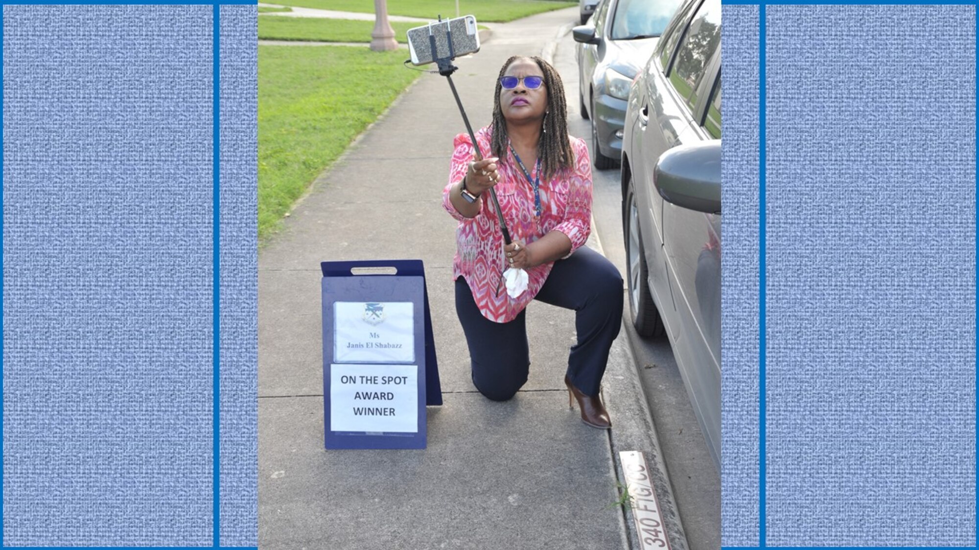 Janis El Shabazz, 340th Flying Training Group public affairs specialist, prepares to shoot a “selfie” for the monthly On-the-Spot Award story. El Shabazz manages the group’s public web and social media pages, writes articles and shoots photos to highlight members of the group and its seven squadrons, and supports a variety of other public affairs functions, civic outreach events, command interest items, and more. El Shabazz is the 340th FTG June On-the-Spot Award winner. (U.S. Air Force photo by Debbie Gildea)