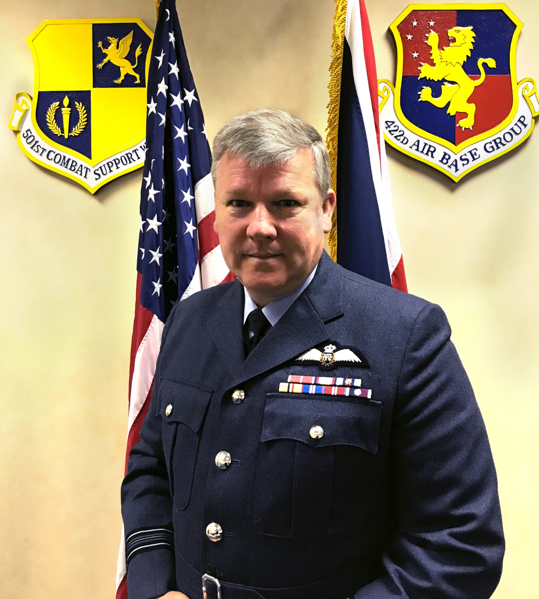 A biographical photo of RAF Squadron Leader Paul Atherton