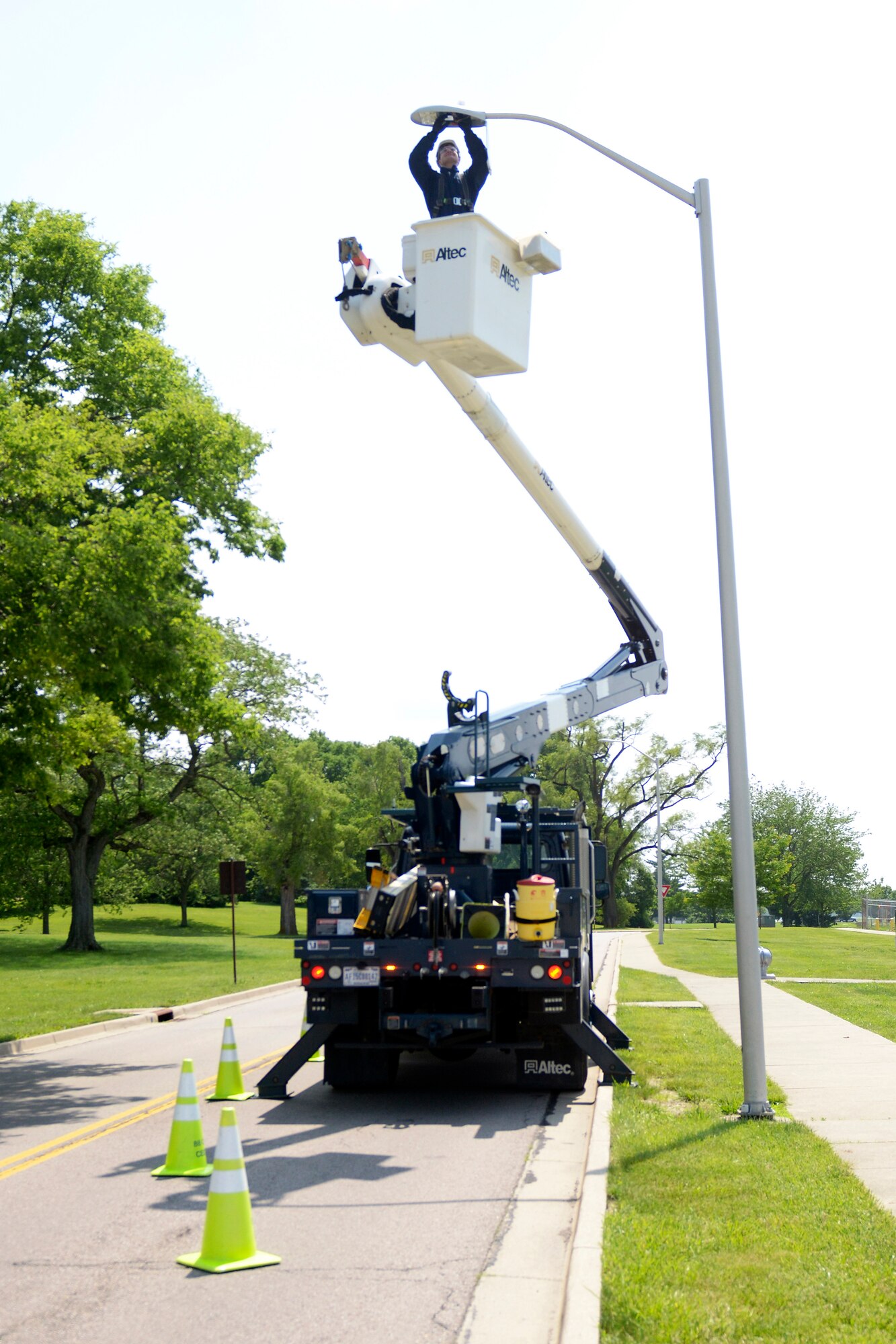 Senior Airman Michael A. Price, electrical systems journeyman, troubleshoots an LED street light June 2, 2019 at Wright-Patterson Air Force Base. The 445th CES electrical shop routinely performs inspections and maintenance on base facilities as a way to support the 88th Air Base Wing