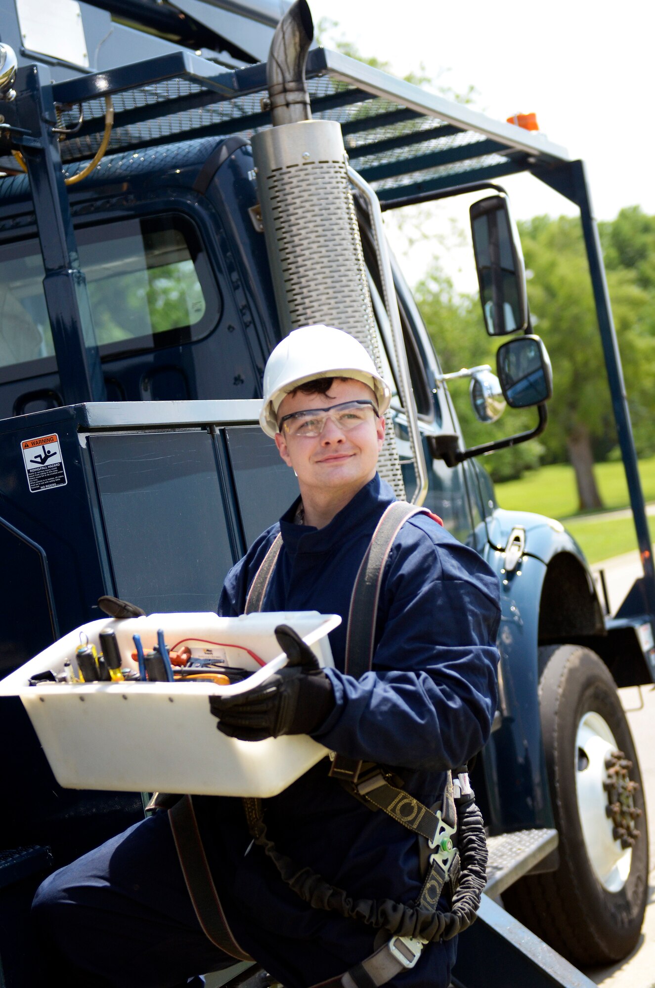 Senior Airman Michael A. Price, electrical systems journeyman, troubleshoots an LED street light June 2, 2019 at Wright-Patterson Air Force Base. The 445th CES electrical shop routinely performs inspections and maintenance on base facilities as a way to support the 88th Air Base Wing