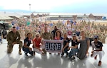 Left to right: Army Command Sgt. Maj. Christopher Kepner, senior enlisted advisor to the chief of the National Guard Bureau; Toni Trucks; Sally Lengyel; Air Force Gen. Joseph Lengyel, chief, National Guard Bureau; Quinton “Rampage” Jackson; Laura Bryna; Anjelah Johnson; Cassadee Pope; Mayim Bialik; and Nia Franklin pose for a photo after a USO performance, Camp Bondsteel, Kosovo, July 4, 2019. Gen. Lengyel is hosting a USO Tour, visiting troops in six countries in three combatant commands.
