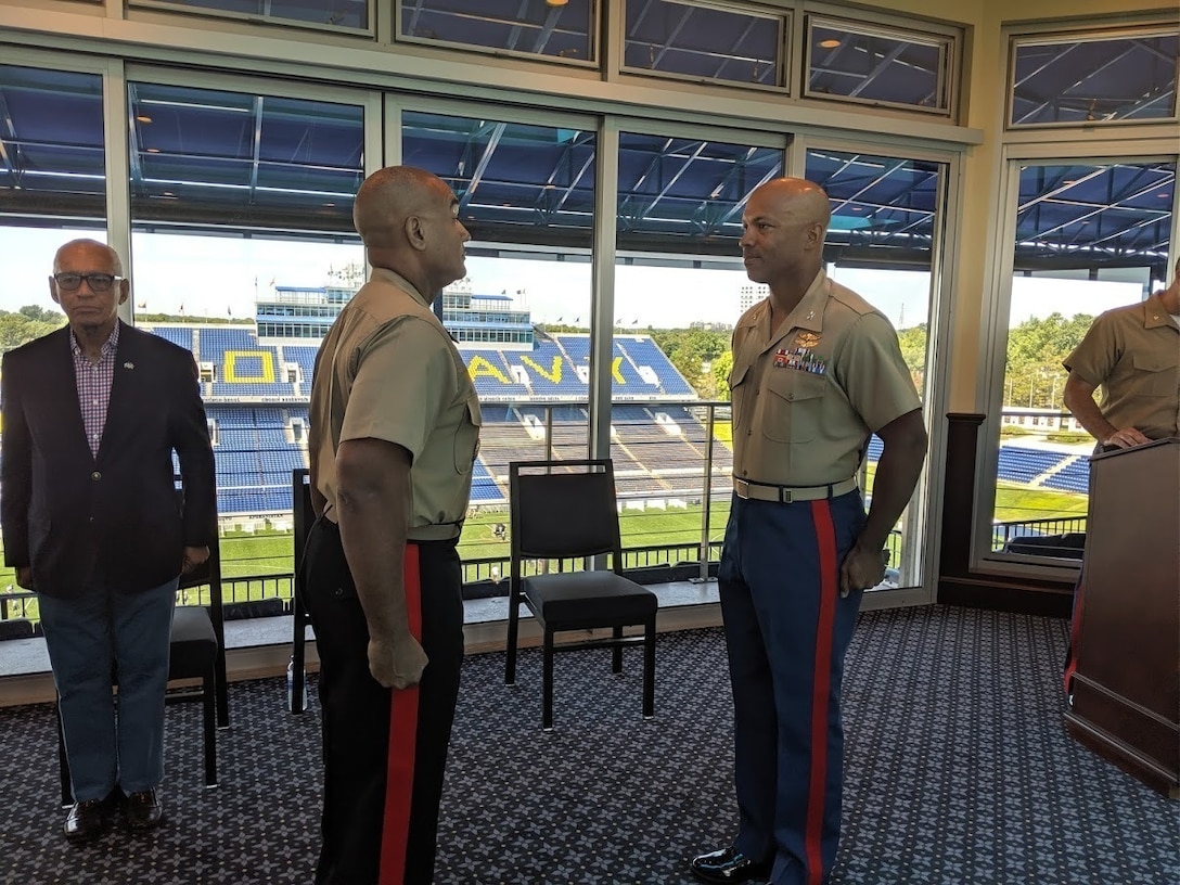 Brig. Gen. Brian Cavanaugh, Deputy Director for Operations, J-3, Joint Staff retires Col. Anthony “Ché” Bolden at a ceremony held on July 3, 2019 at the Navy-Marine Corps Stadium’s Akerson Tower in Annapolis, Md.