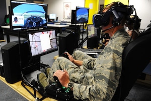 Cade Cavanagh, a cadet first class at the U.S. Air Force Academy, uses the high-tech Pilot Training Next program at the Academy to learn basic aviation skills. This summer, the Academy and Air Education and Training Command are hosting training sessions to explore the benefits of exposing students to aviation skills using virtual reality technology.