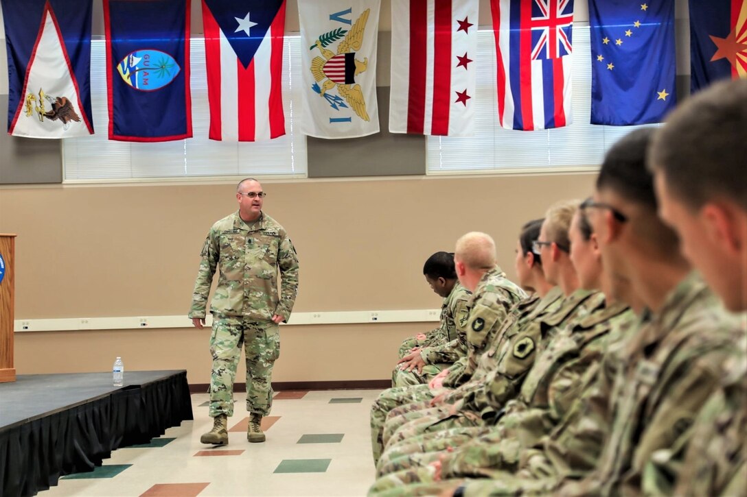 Army Reserve CSM visits with Fort McCoy NCOA students