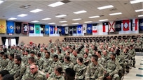 Army Reserve CSM visits with Fort McCoy NCOA students