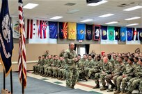Army Reserve CSM visits with Fort McCoy NCOA students