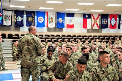 Army Reserve CSM visits with Fort McCoy NCOA students