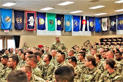 Army Reserve CSM visits with Fort McCoy NCOA students