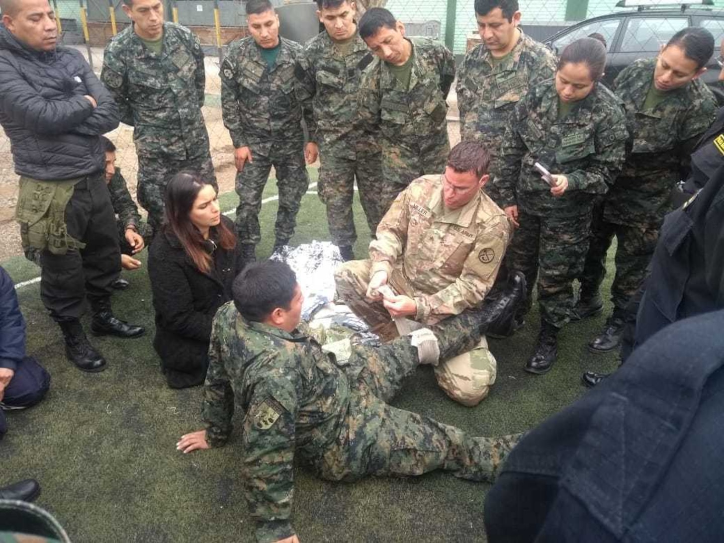 Sgt. Brad Miller, a medical readiness non-commissioned officer with the West Virginia Army National Guard (WVARNG) medical detachment, provides training on tactical casualty combat care (TCCC) to members of the Peruvian Armed Forces during a hands-on training held July 2, 2019, in Lima, Peru. Members of the WVARNG trained more than 120 members of the Peruvian Armed Forces and the Peruvian National Police on a variety of aeromedical topics during a week-long subject matter exchange. (Courtesy photo)