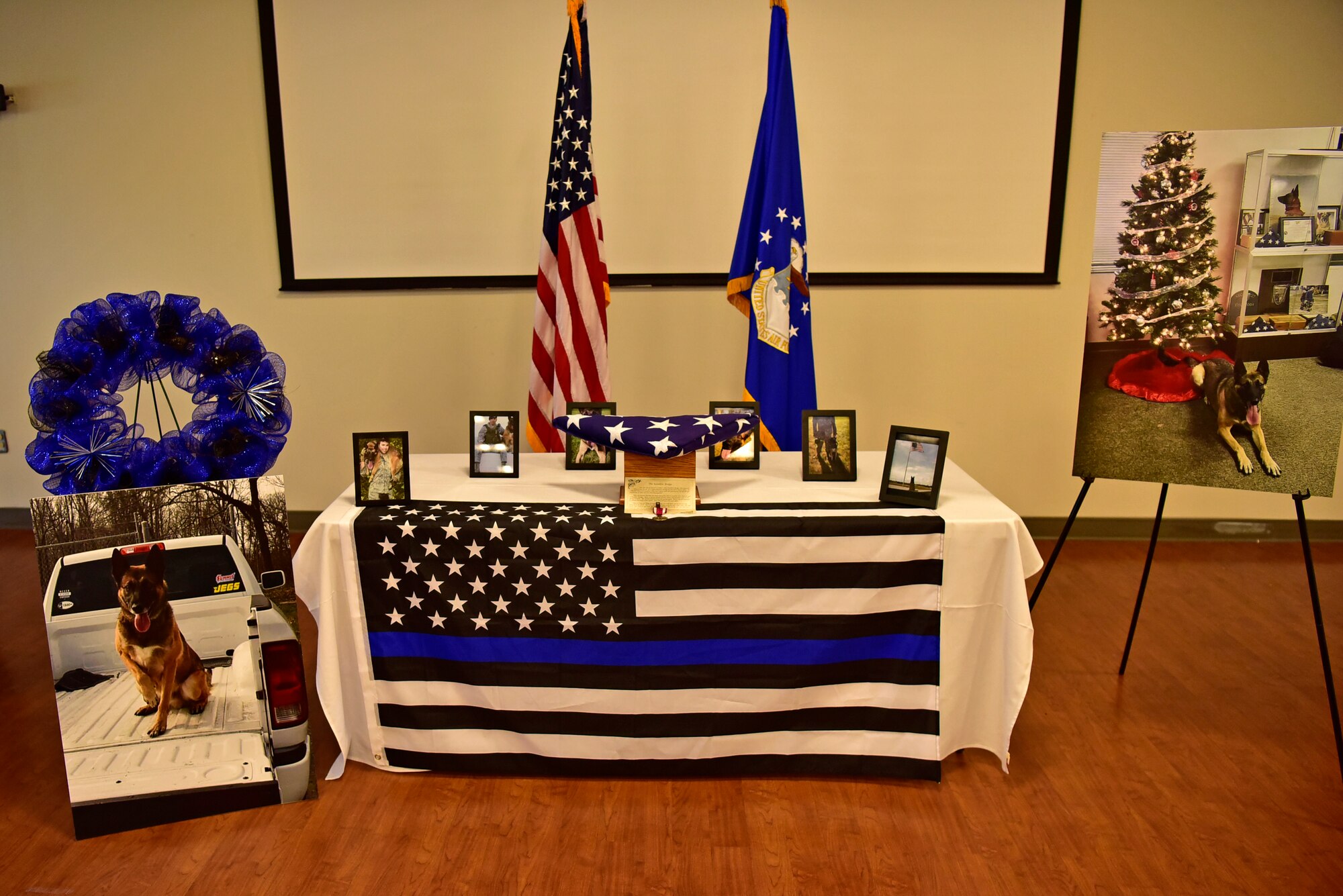 A memorial service was held for Military Working Dog Tommy at the Community Commons on Joint Base Andrews, Md., July 3, 2019. Tommy was accepted into the MWD program in 2014 and clocked in countless hours of explosives detection. (U.S. Air Force photo by Airman 1st Class Noah Sudolcan)