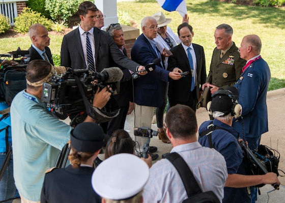 Marine Corps Gen. Joe Dunford, chairman of the Joint Chiefs of Staff, and Finnish Air Force Gen. Jarmo Lindberg, Finnish Chief of Defense, speak to media following an Armed Forces Full Honor Arrival Ceremony on Whipple Field at Joint Base Myer-Henderson Hall, July 9, 2019.