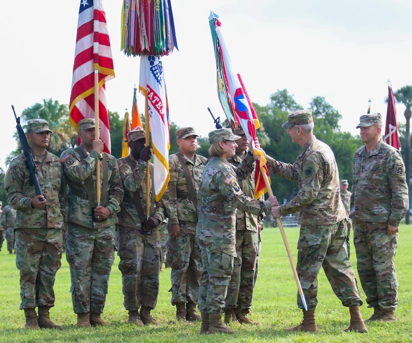 U.S. Army Lt. Gen. Laura J. Richardson, incoming U.S. Army North commander, accepts the Army North (Fifth Army) colors from U.S. Air Force Gen. Terrence J. O’Shaughnessy, commanding general, U.S. Northern Command, during the change of command ceremony at Joint Base San Antonio-Fort Sam Houston July 8. Richardson most recently served at U.S. Army Forces Command at Fort Bragg, North Carolina, where she was the deputy commanding general.