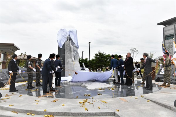 The ROK-U.S. Alliance sculpture is unveiled during a ceremony July 10 at the United States Forces Korea Headquarters building, Camp Humphreys, Republic of Korea.