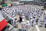 YOKOSUKA, Japan (July 2, 2019)  Adm. John Aquilino, commander, U.S. Pacific Fleet speaks to the ship's crew during an awards ceremony recognizing 50 Sailors who distinguished themselves for their bravery and contributions to damage control efforts during the 2017 collision aboard the guided-missile destroyer USS John S. McCain (DDG 56), currently berthed at Commander, Fleet Activities Yokosuka, Japan. McCain was commissioned on July 2, 1994 in Bath, Maine and was originally named in honor of Admirals John S. McCain Sr. and Jr. In a rededication ceremony on July 12, 2018 the late Sen. John S. McCain III was officially added to the namesake.