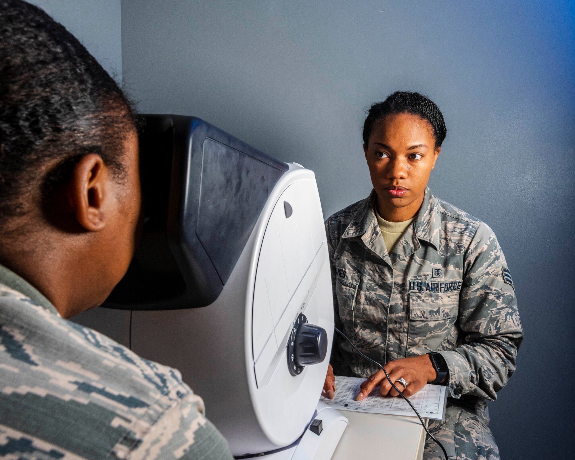 Senior Airman Kaylan James, Flight and Operation Medical Technician assigned to the 913th Aerospace Medicine Squadron, conducts a visual exam on a patient, June 13, 2019 at Little Rock Air Force Base, Arkansas. In addition to primary duties, she teaches basic life support certification to the host active duty population and the tenant reservists, and is a physical training leader who facilitates official testing over drill weekends. (U.S. Air Force Reserve photo by Maj. Ashley Walker)