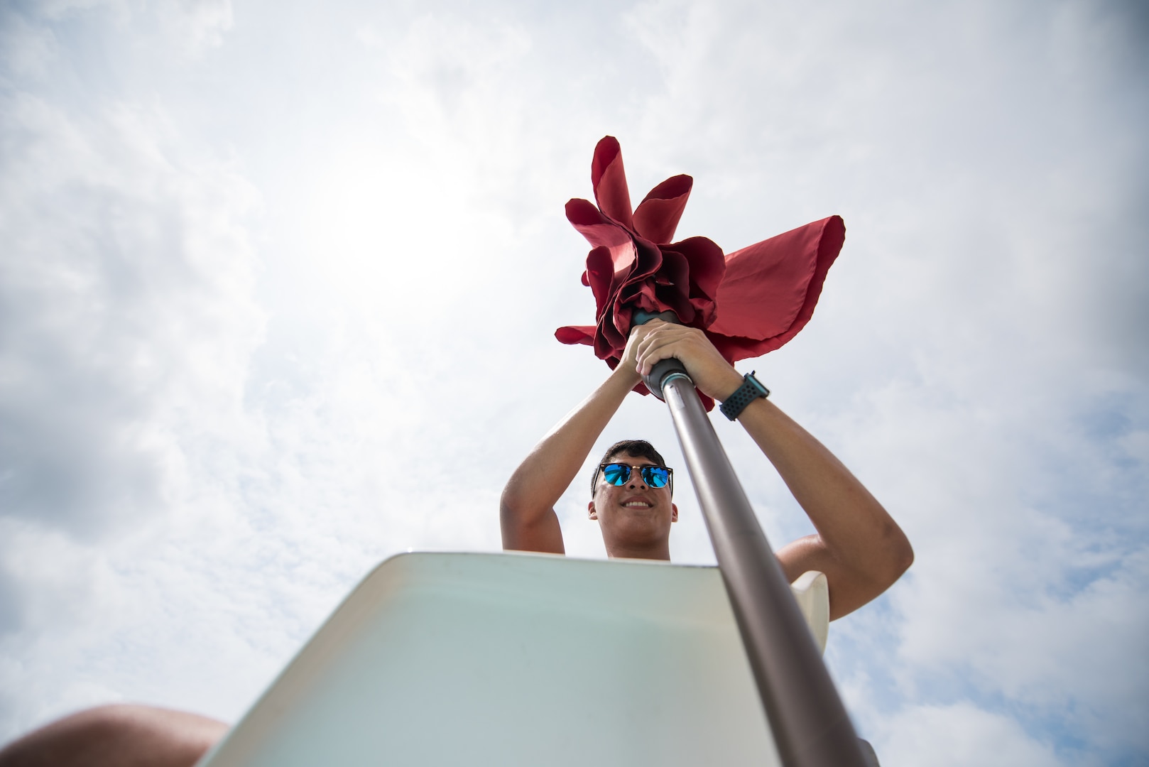 Eric Medelez, 502nd Force Support Squadron lifeguard, aged 17 and son of Master Sgt. Martha Vasquez-Medelez, 149th Fighter Wing, does his morning checks before opening the Warhawk pool, June 21, 2019, at Joint Base San Antonio-Lackland, Texas.